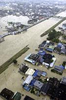 Heavy rain breaks river embankment